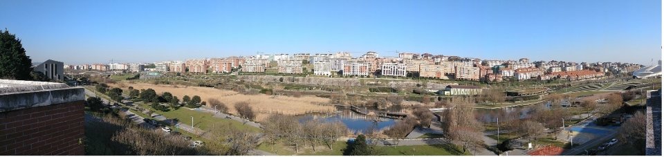 Panoramic view of the Las Llamas Park. In the right, the east side with the Palacio de Deportes, at the left, the west side with the Arenas bridge.  